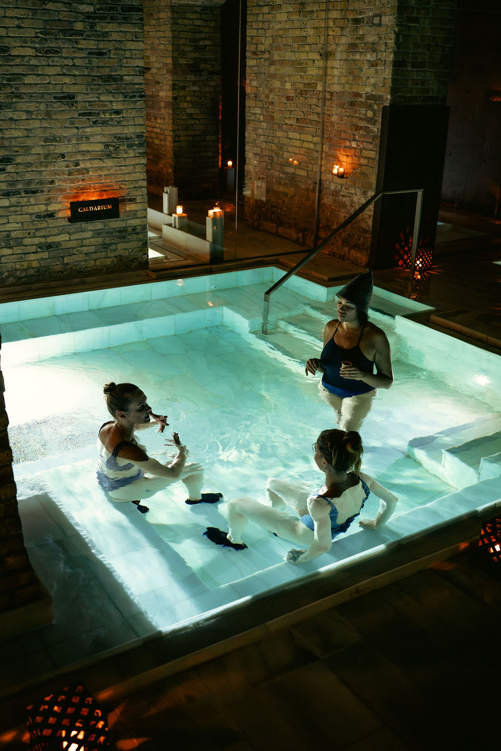 Guests gathered together in the warm pool